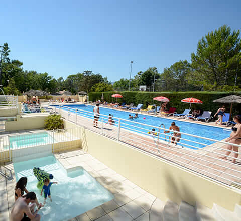 The paddling pool in Le Parc campsite, situated in the heart of nature in Provence